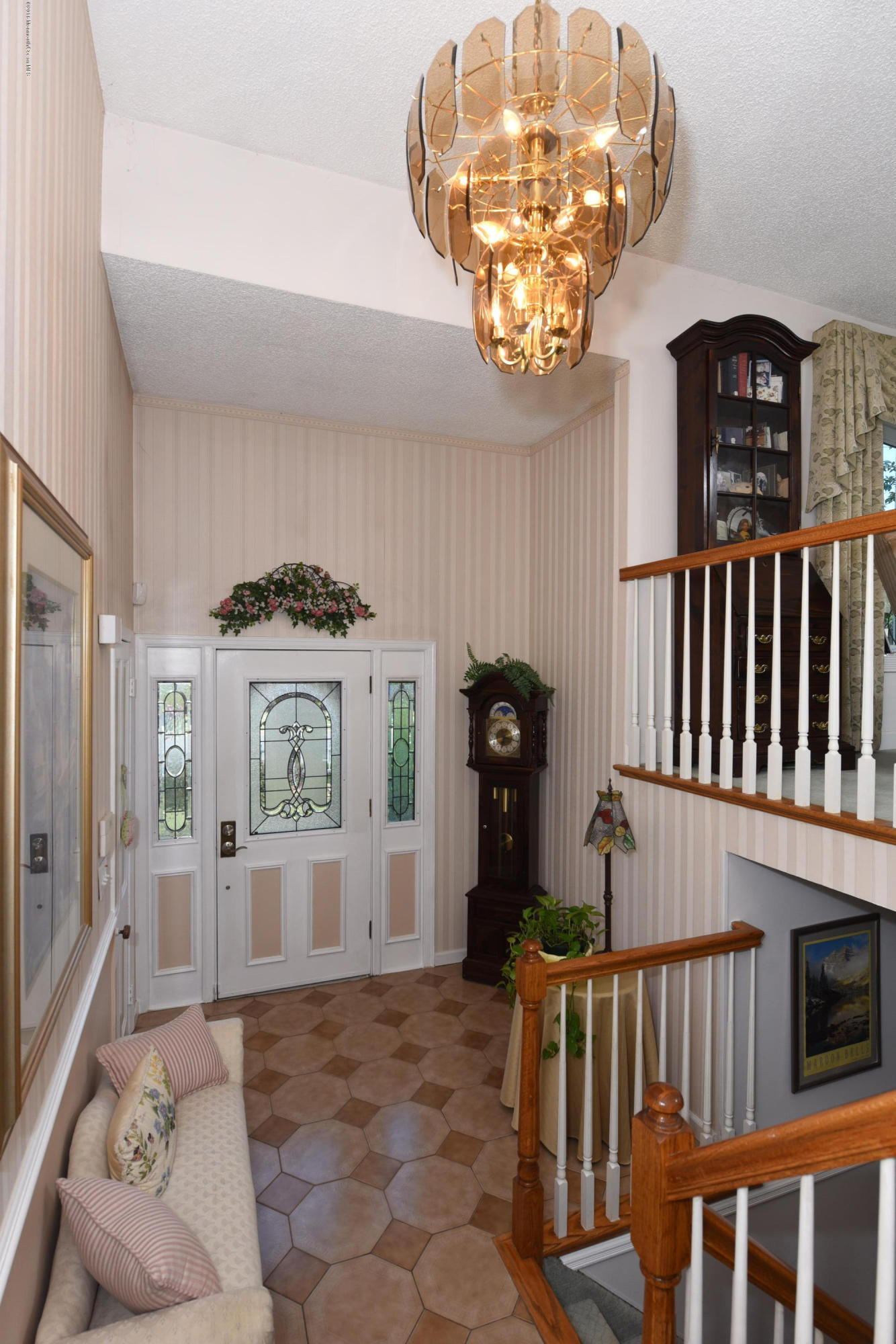22 Walling Road Freehold, NJ 07728 - Photo 6 of 36 a view of entryway and hall with a dining space
