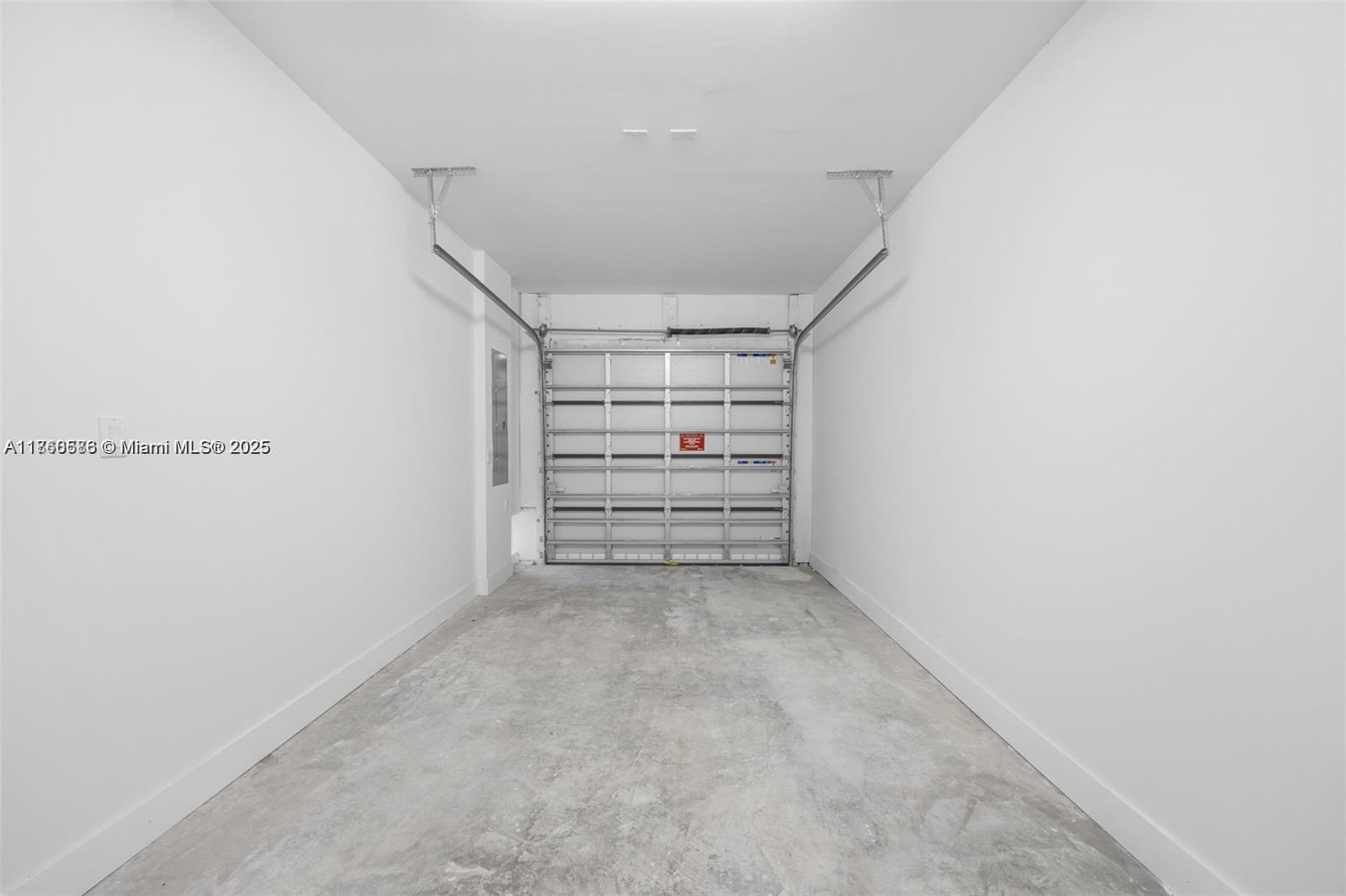 18970 Southwest 345th Terrace Homestead, FL 33034 - Photo 18 of 19 a view of walk in closet with empty racks