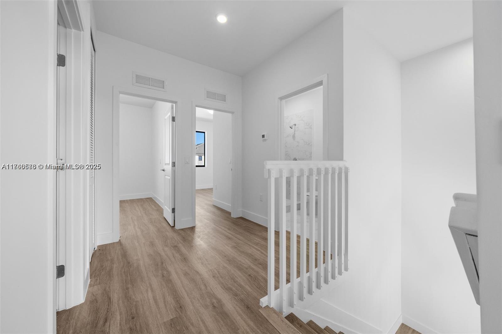 18970 Southwest 345th Terrace Homestead, FL 33034 - Photo 10 of 19 a view of hallway with wooden floor