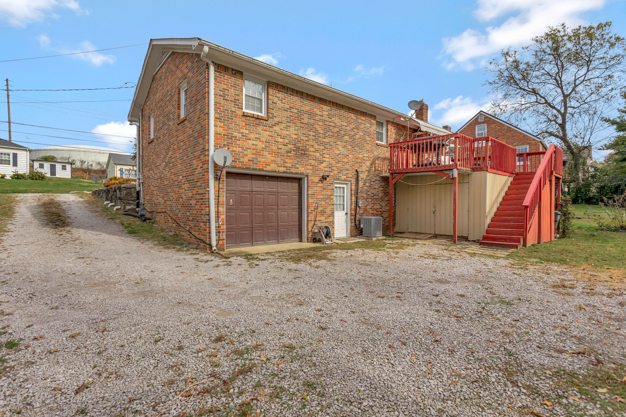 108 8th Avenue Columbia, TN 38401 - Photo 3 of 30 a view of a house with a backyard
