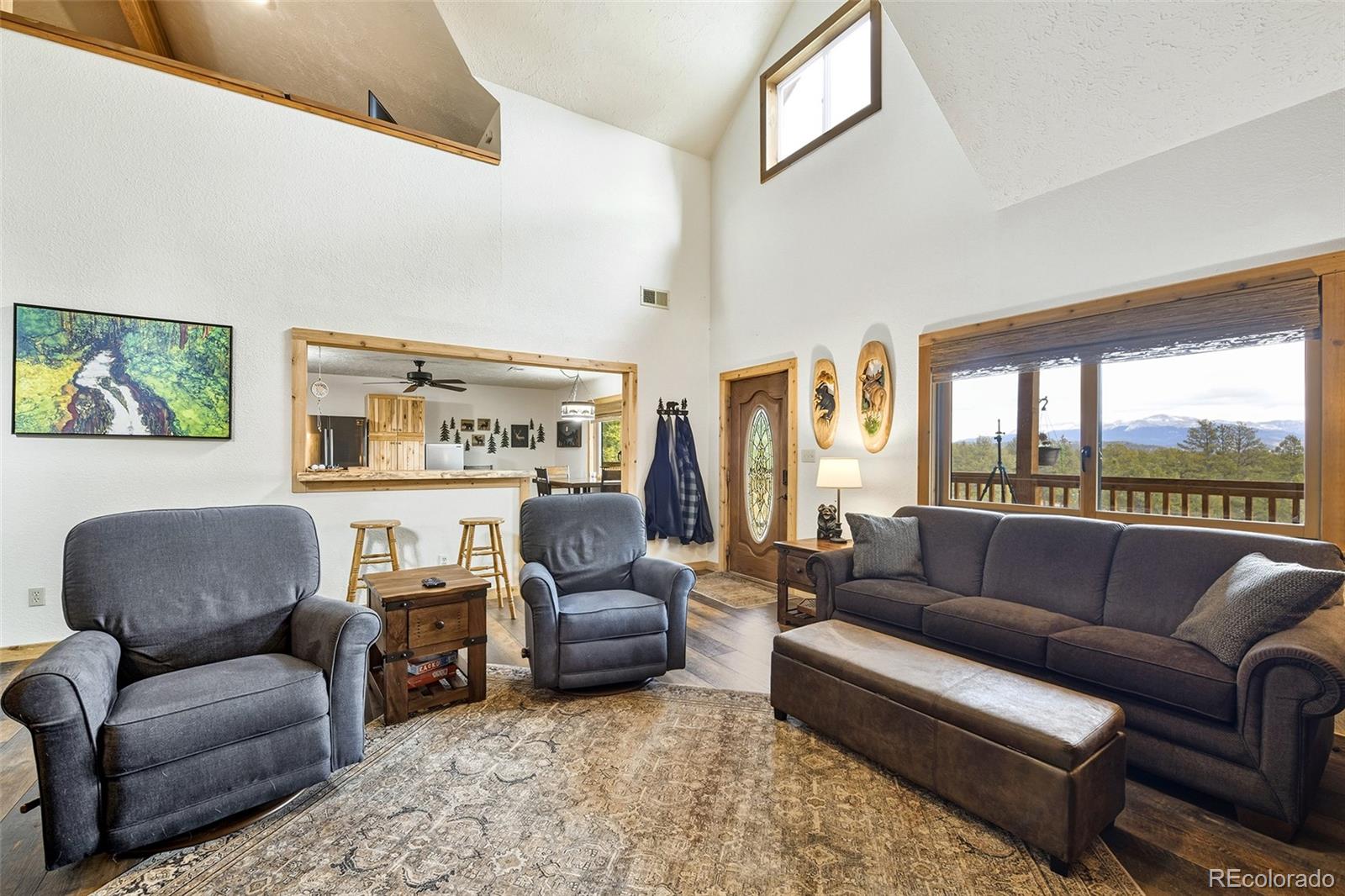 111 Twinkle Road Guffey, CO 80820 - Photo 14 of 39 a living room with furniture and a large window