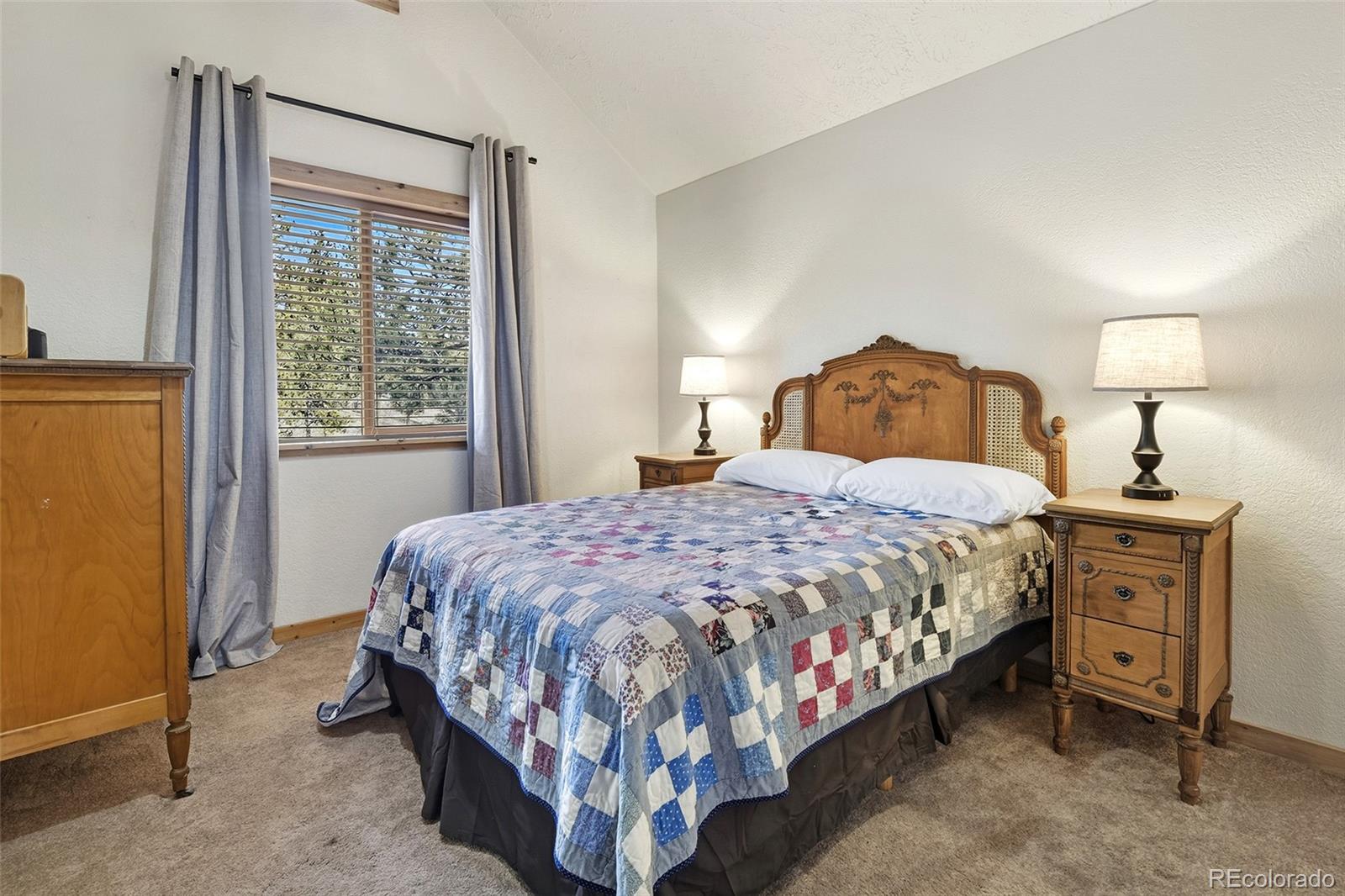 111 Twinkle Road Guffey, CO 80820 - Photo 30 of 39 a bedroom with a bed and a window