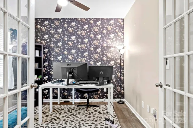 a living room with a couch and a fireplace