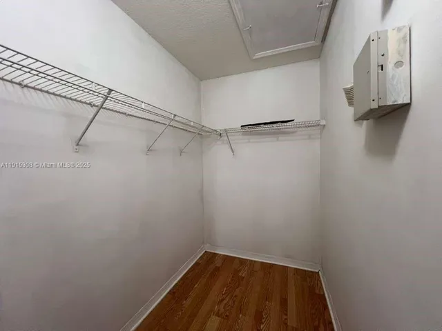 a view of a room with racks on the wall