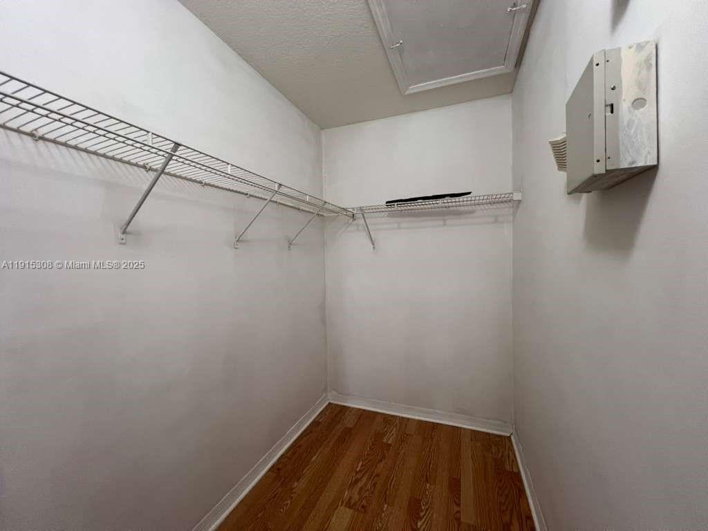 1261 Southeast 31st Court, Unit 20453 Homestead, FL 33035 - Photo 15 of 15 a view of a room with racks on the wall