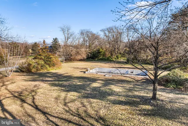 a view of a yard with an outdoor space