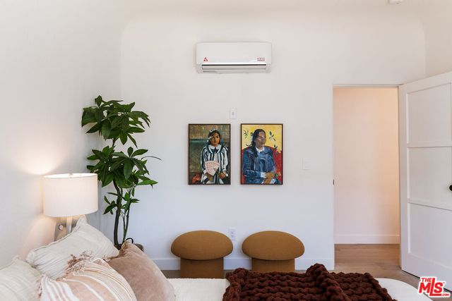 a bathroom with a double vanity sink and mirror
