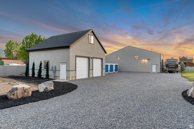 1526 South 500 West Mapleton, UT 84664 - Photo 36 of 54 Garage at dusk featuring a detached garage