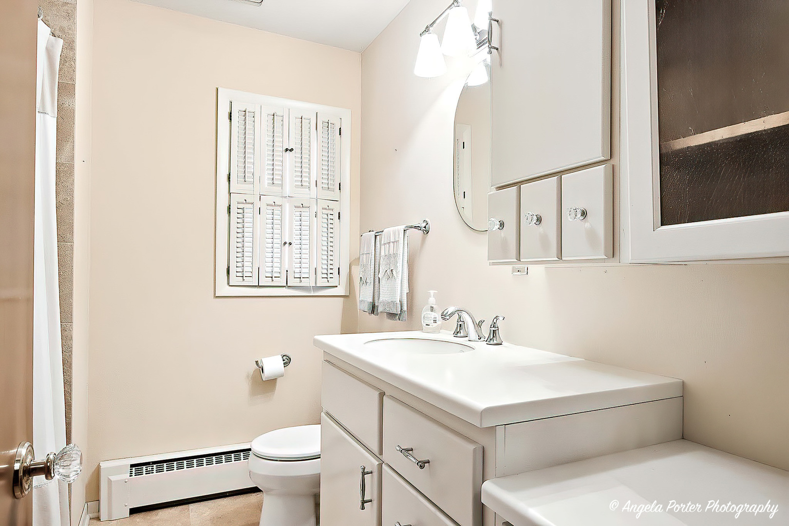N613 County Rd U Genoa City, WI 53128 - Photo 11 of 22 a bathroom with a sink toilet and a mirror
