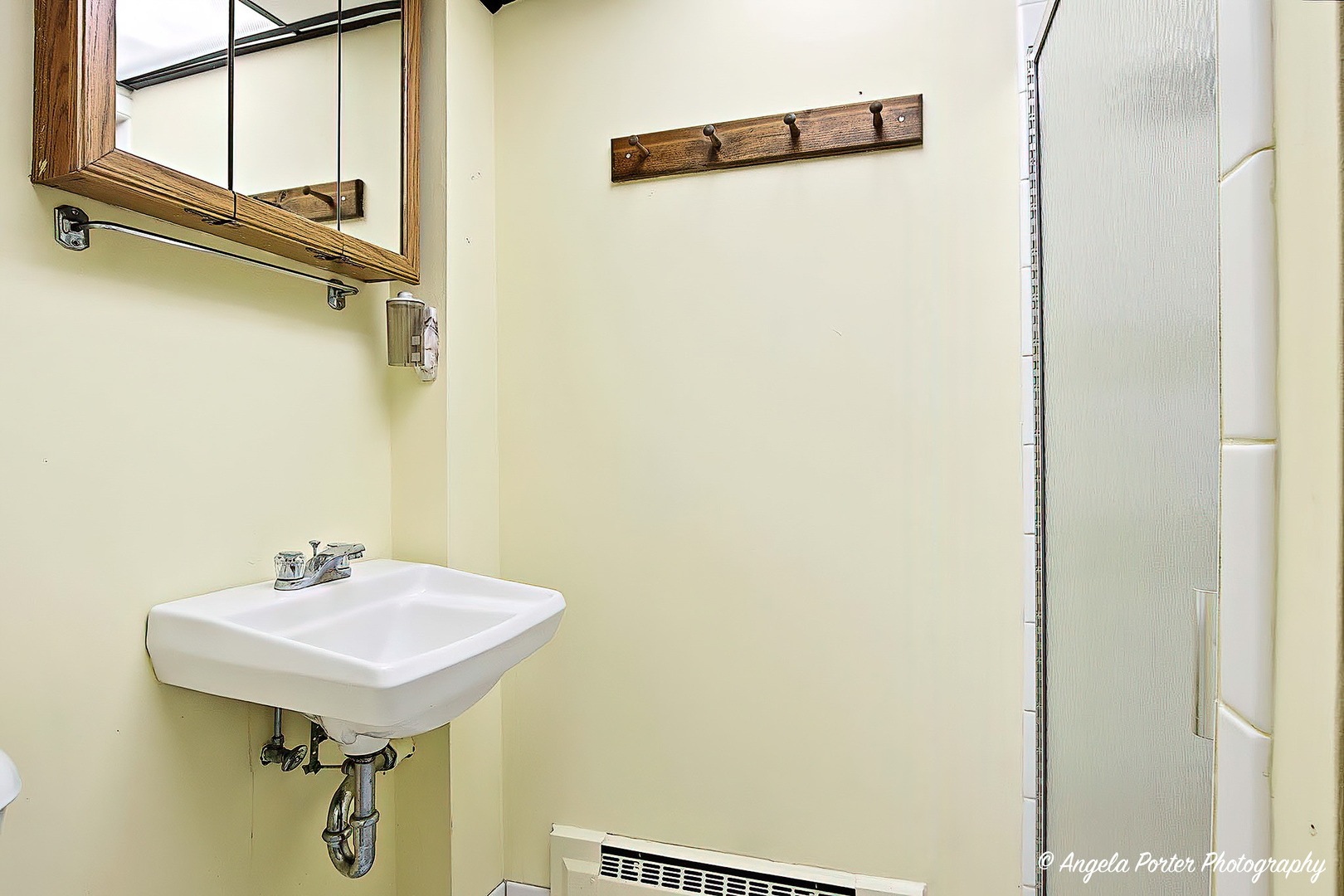 N613 County Rd U Genoa City, WI 53128 - Photo 17 of 22 a bathroom with a sink and mirror