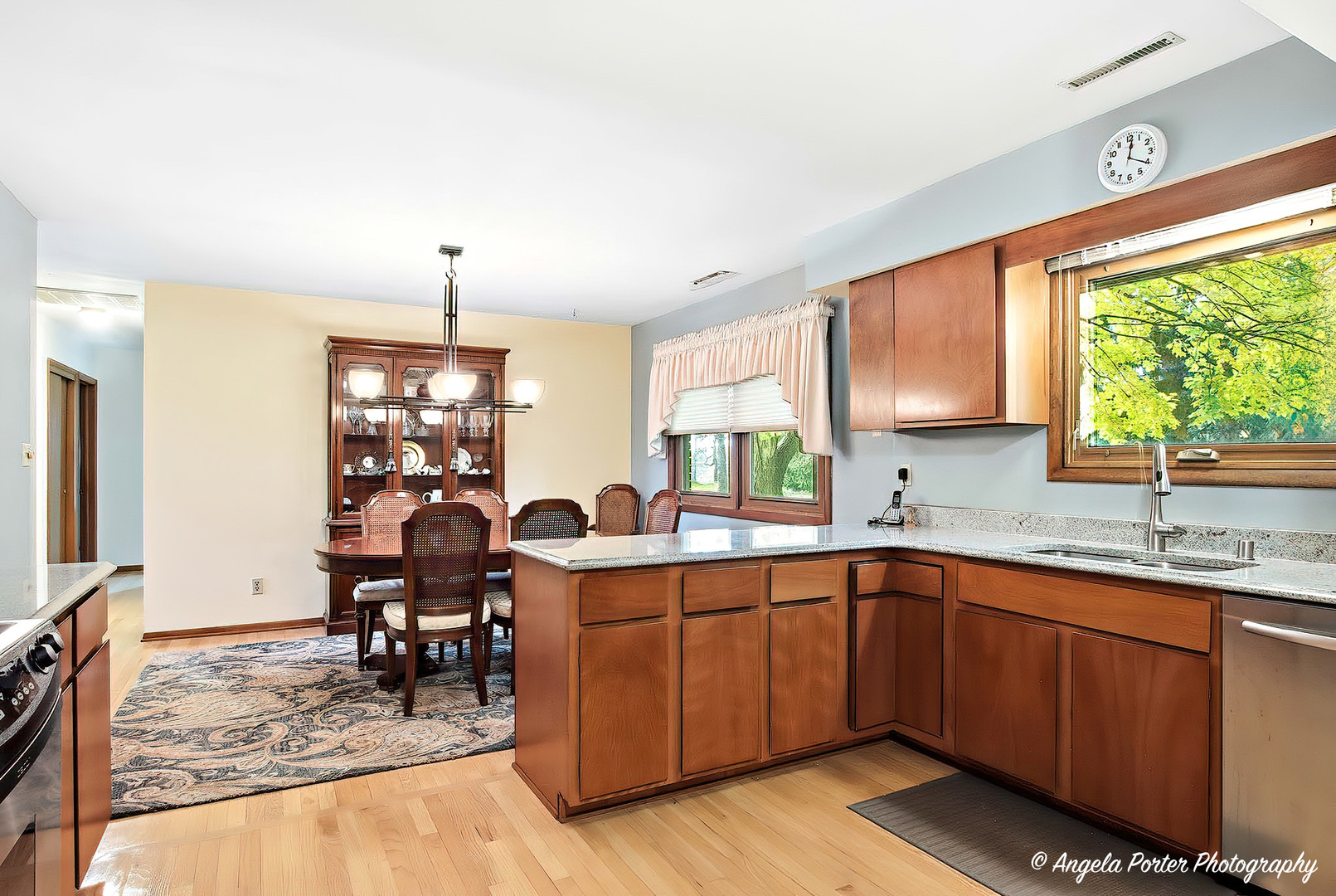 N613 County Rd U Genoa City, WI 53128 - Photo 3 of 22 a kitchen with lots of counter top space and dining table