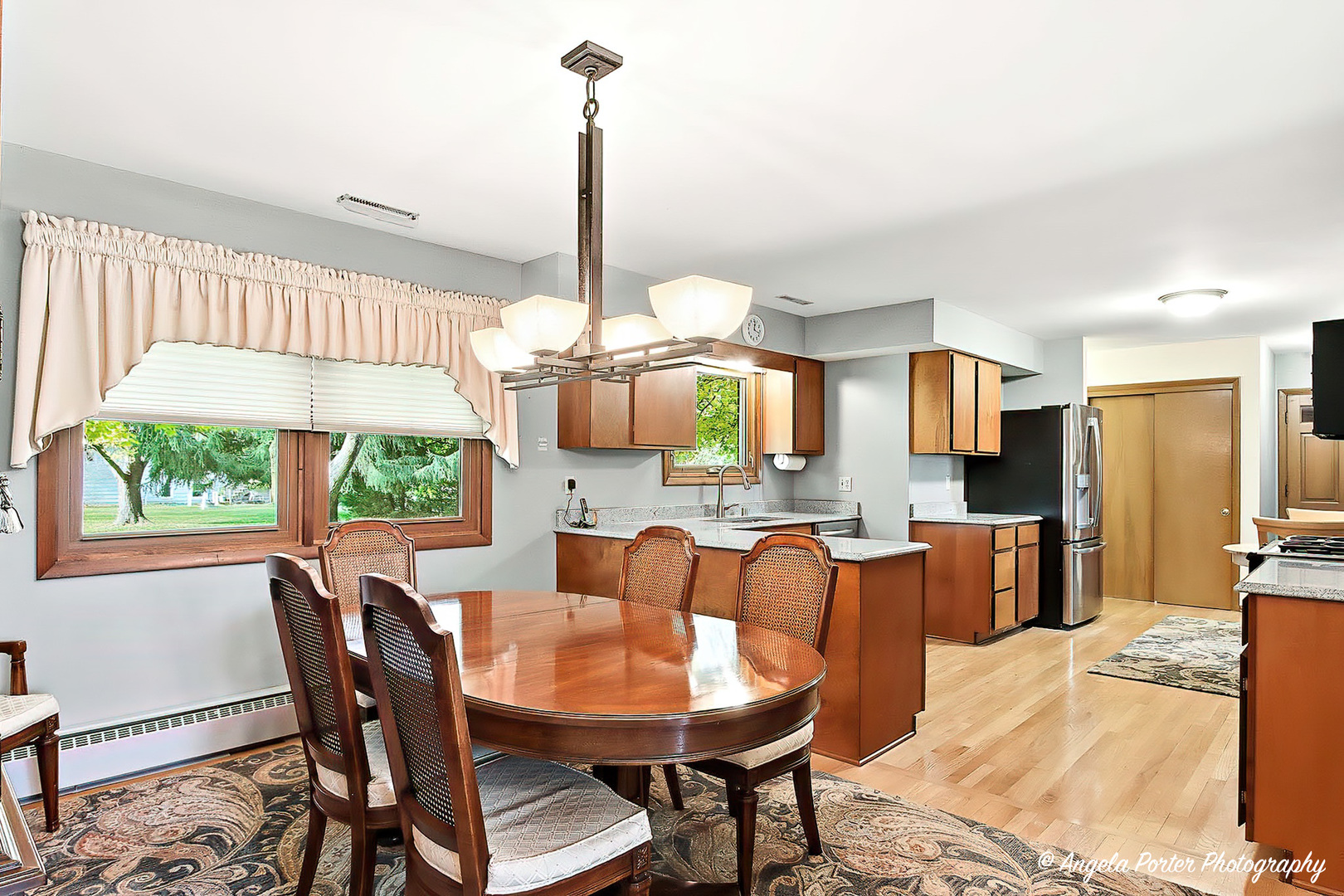 N613 County Rd U Genoa City, WI 53128 - Photo 4 of 22 a view of a dining room with furniture window and wooden floor