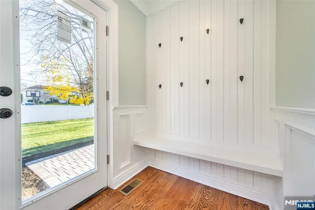 a bathroom with a shower and a bath tub