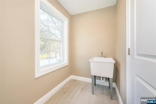 a view of backyard with small cabin