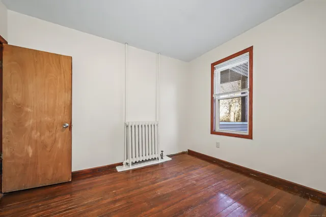 a bathroom with a toilet a sink and bathtub