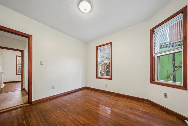 a view of a room with racks on the wall