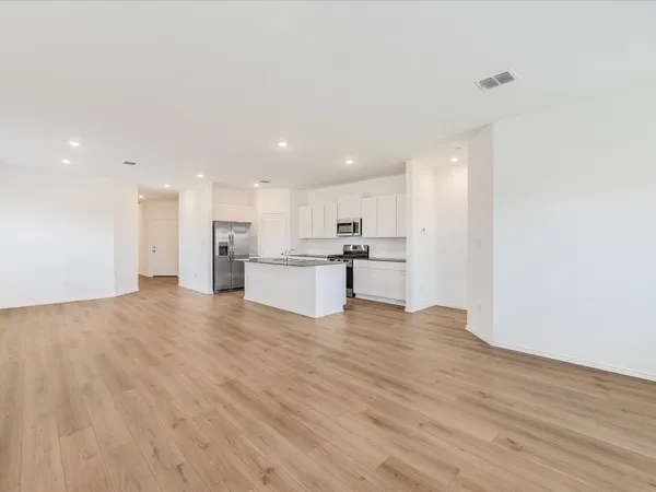 a view of kitchen with wooden floor