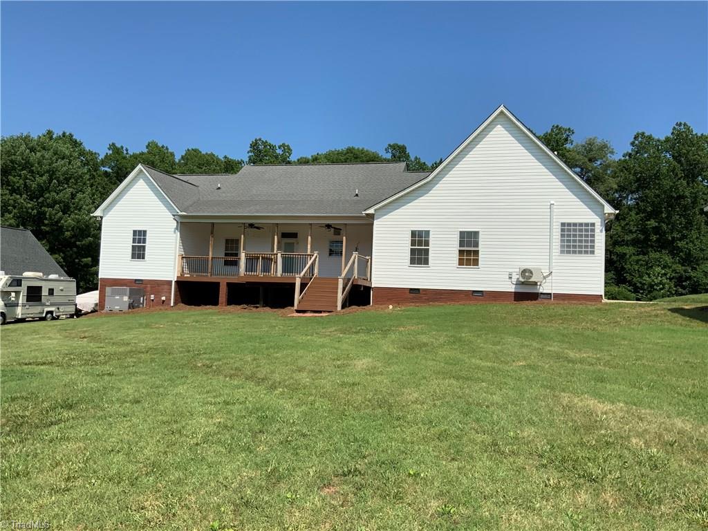 3369 Old Mountain Road Trinity, NC 27370 - Photo 2 of 17 Back side of house with the large deck for entertaining