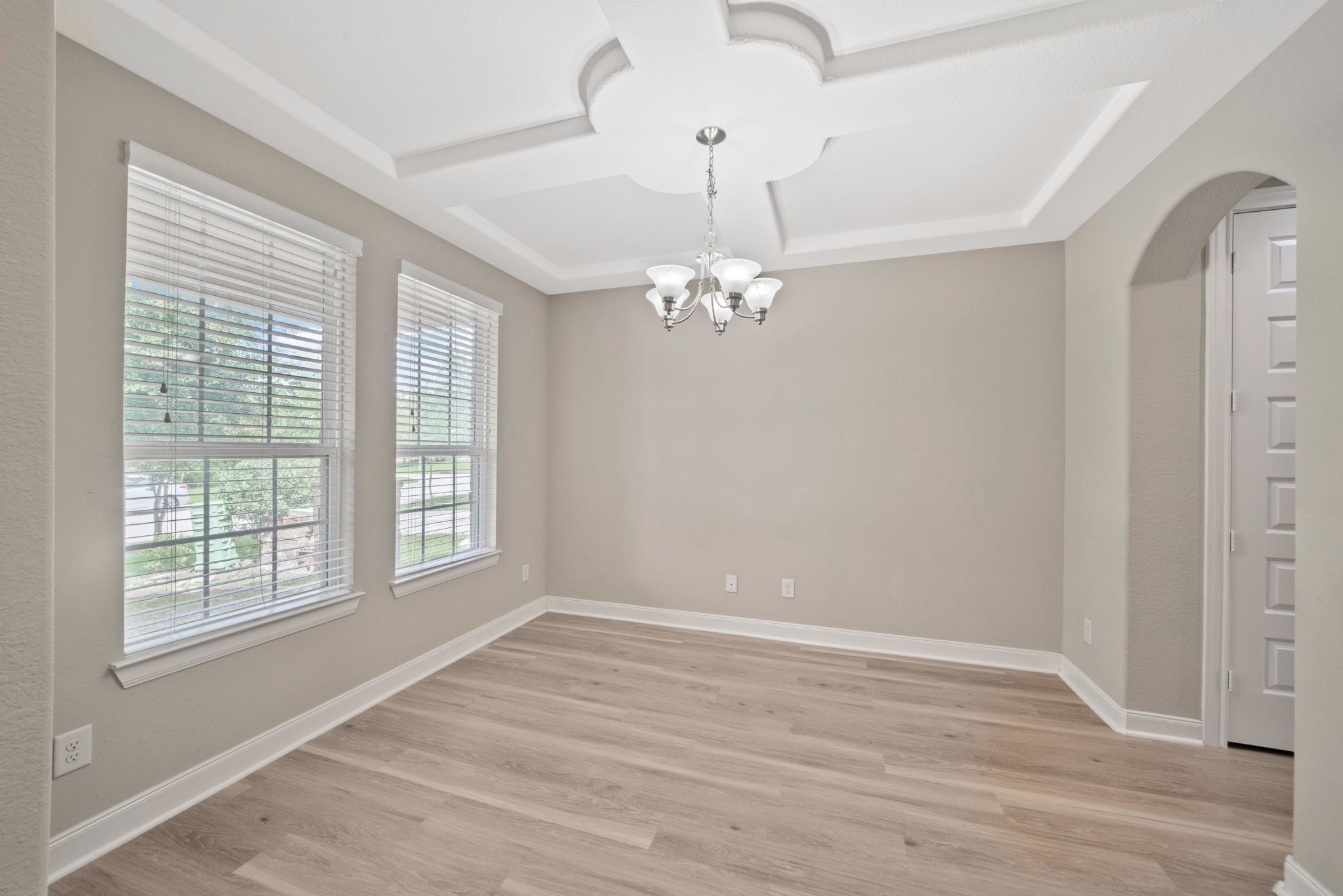 22523 Birch Ridge Meadow Drive Spring, TX 77389 - Photo 10 of 39 a view of an empty room with wooden floor and a window