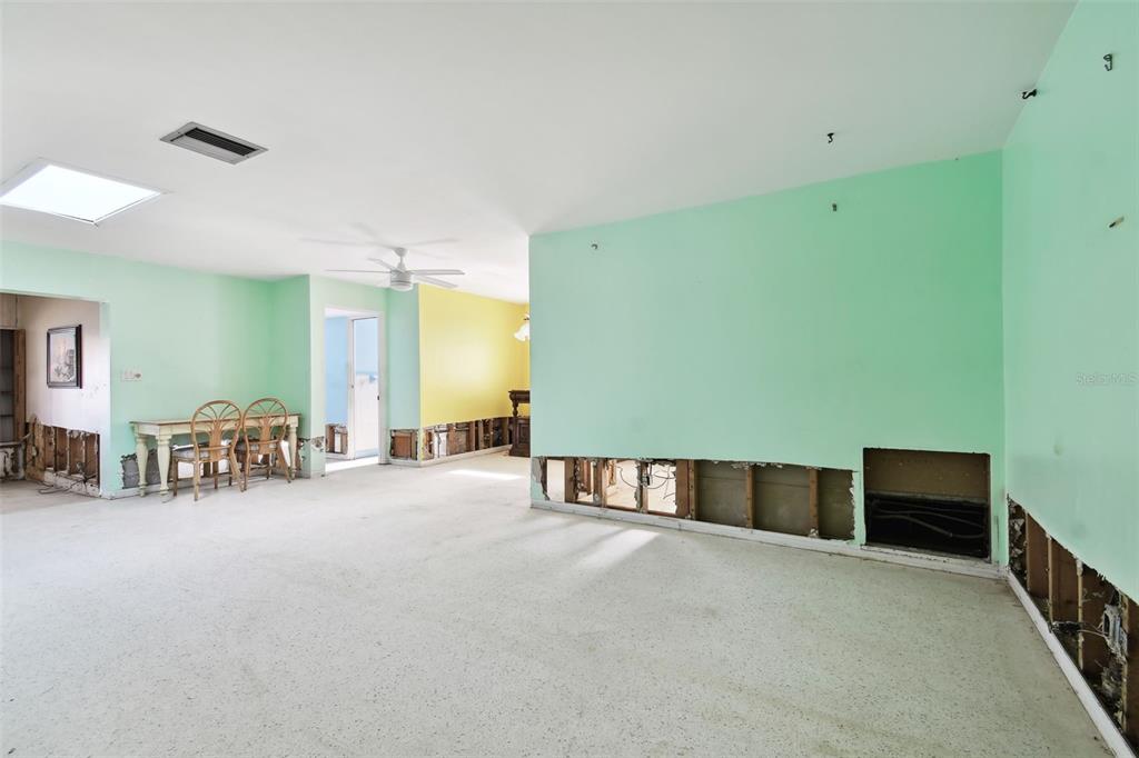 545 Lillian Drive Madeira Beach, FL 33708 - Photo 12 of 100 a view of a livingroom with furniture and toys