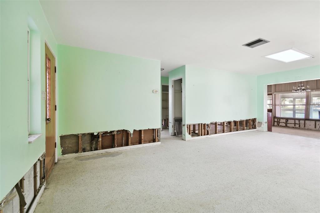 545 Lillian Drive Madeira Beach, FL 33708 - Photo 13 of 100 a view of an empty room with windows