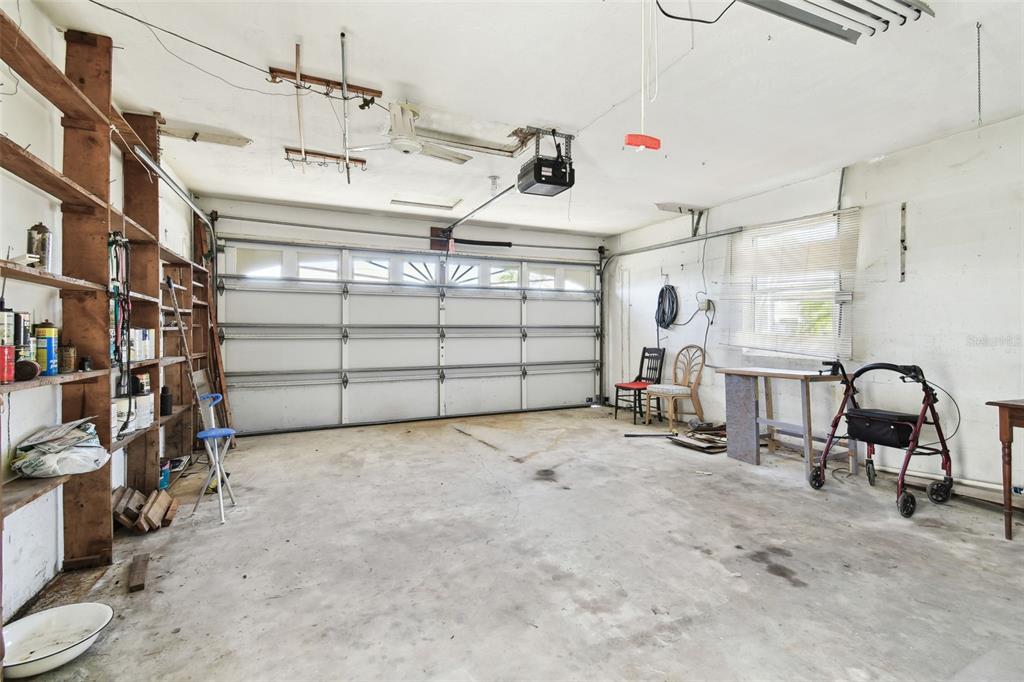 545 Lillian Drive Madeira Beach, FL 33708 - Photo 26 of 100 a view of a garage with storage