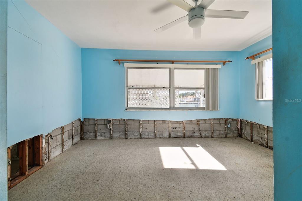 545 Lillian Drive Madeira Beach, FL 33708 - Photo 31 of 100 an empty room with windows