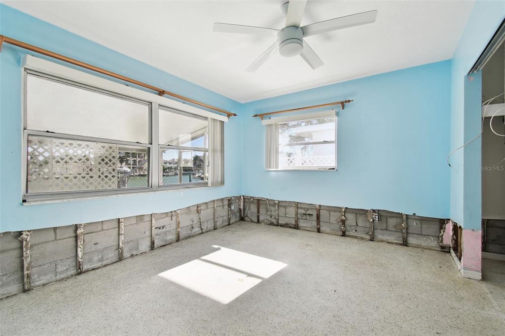 545 Lillian Drive Madeira Beach, FL 33708 - Photo 32 of 100 a view of an empty room with a window