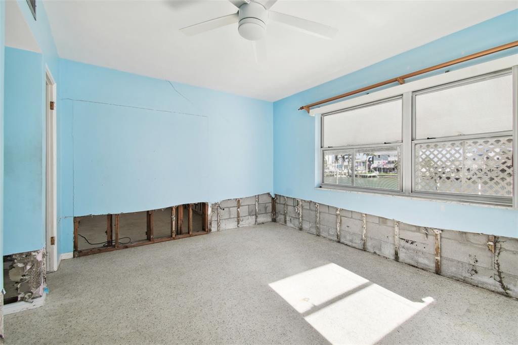 545 Lillian Drive Madeira Beach, FL 33708 - Photo 35 of 100 a view of an empty room with a window