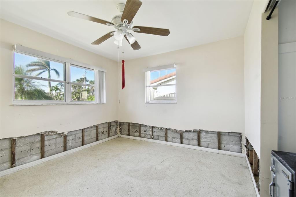 545 Lillian Drive Madeira Beach, FL 33708 - Photo 41 of 100 a view of an empty room with a window