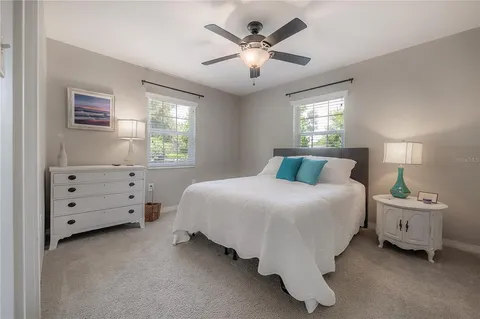 a bed room with a bed and a window