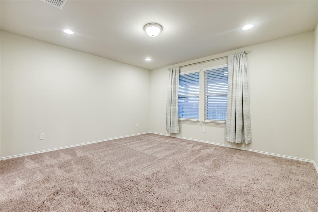 7793 Gulf Walk Road Frisco, TX 75036 - Photo 15 of 28 an empty room with a empty space and windows