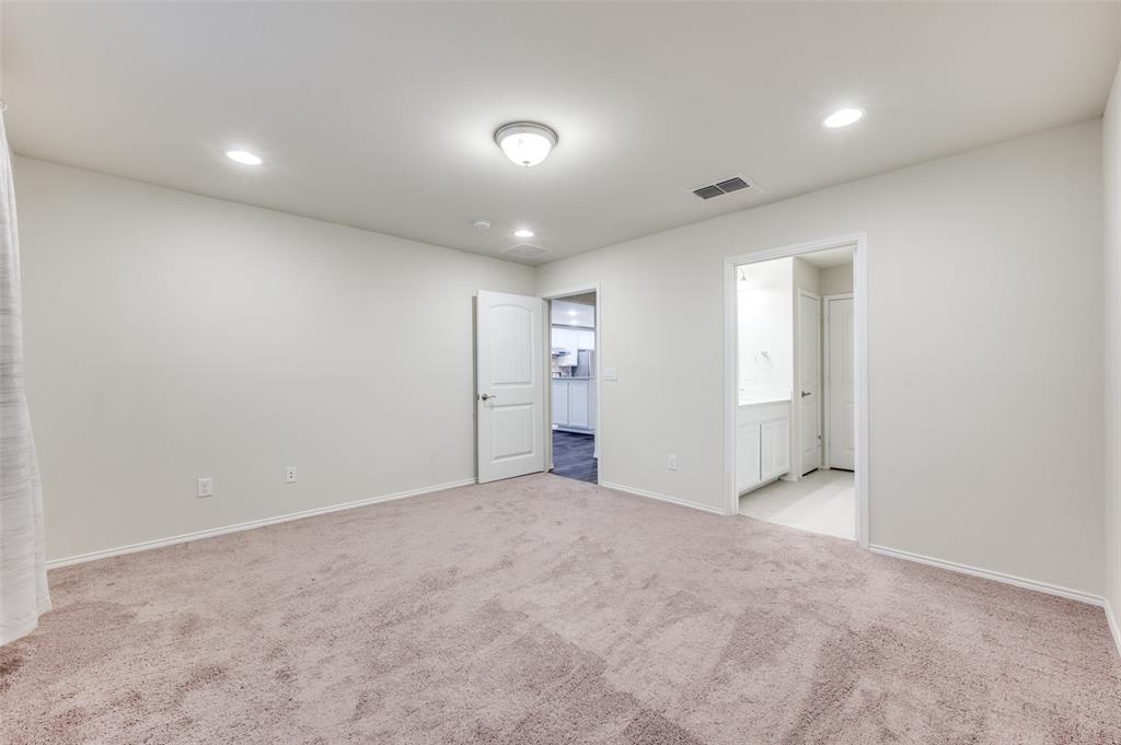 7793 Gulf Walk Road Frisco, TX 75036 - Photo 16 of 28 an empty room with an entryway