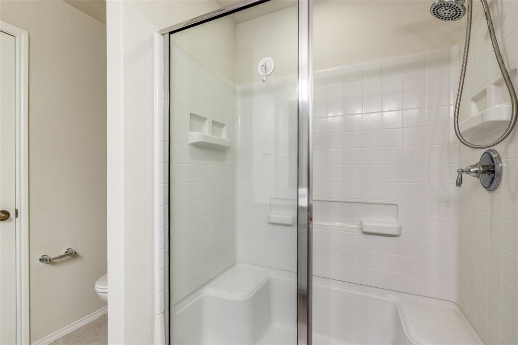 7793 Gulf Walk Road Frisco, TX 75036 - Photo 18 of 28 a bathroom with a shower