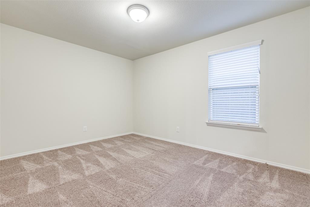 7793 Gulf Walk Road Frisco, TX 75036 - Photo 19 of 28 an empty room with a window
