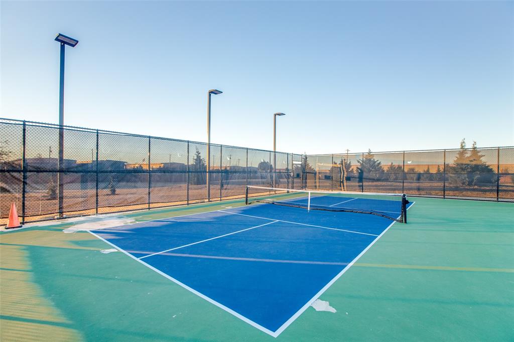 7793 Gulf Walk Road Frisco, TX 75036 - Photo 23 of 28 a view of a tennis court