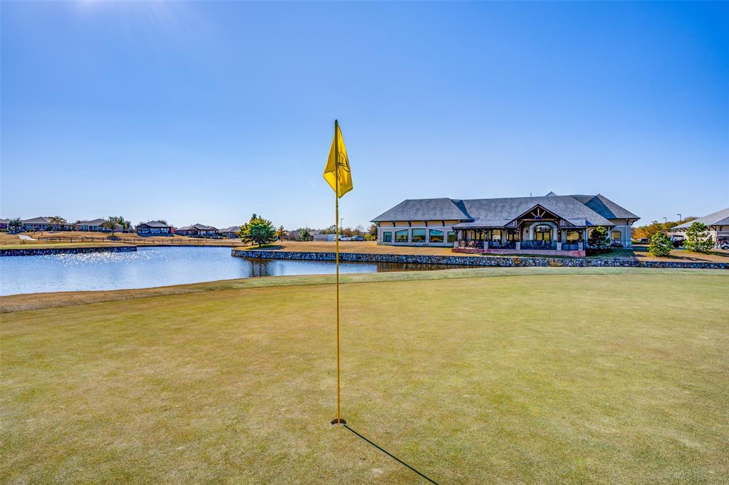 7793 Gulf Walk Road Frisco, TX 75036 - Photo 24 of 28 a view of a swimming pool and an outdoor seating