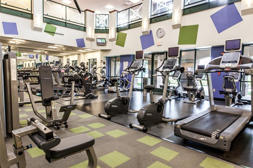 7793 Gulf Walk Road Frisco, TX 75036 - Photo 25 of 28 a gym room with lots of gym equipment