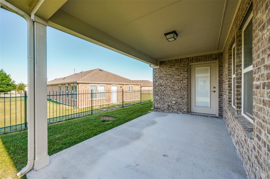 7793 Gulf Walk Road Frisco, TX 75036 - Photo 27 of 28 a view of a house with a porch