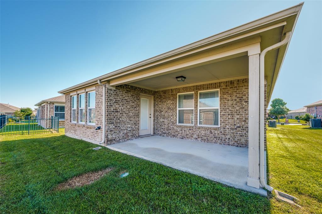 7793 Gulf Walk Road Frisco, TX 75036 - Photo 28 of 28 a view of house with backyard porch and garden