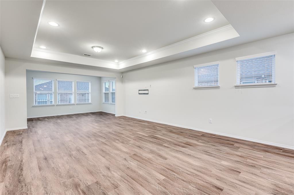 7793 Gulf Walk Road Frisco, TX 75036 - Photo 7 of 28 an empty room with windows