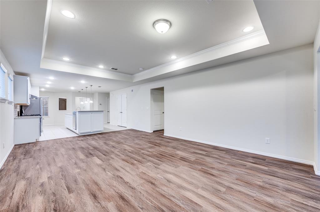 7793 Gulf Walk Road Frisco, TX 75036 - Photo 10 of 28 a view of empty room with wooden floor