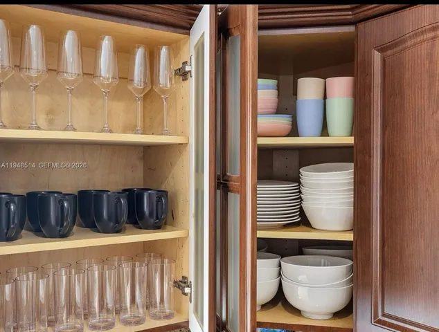 a bathroom with a bathtub and a window