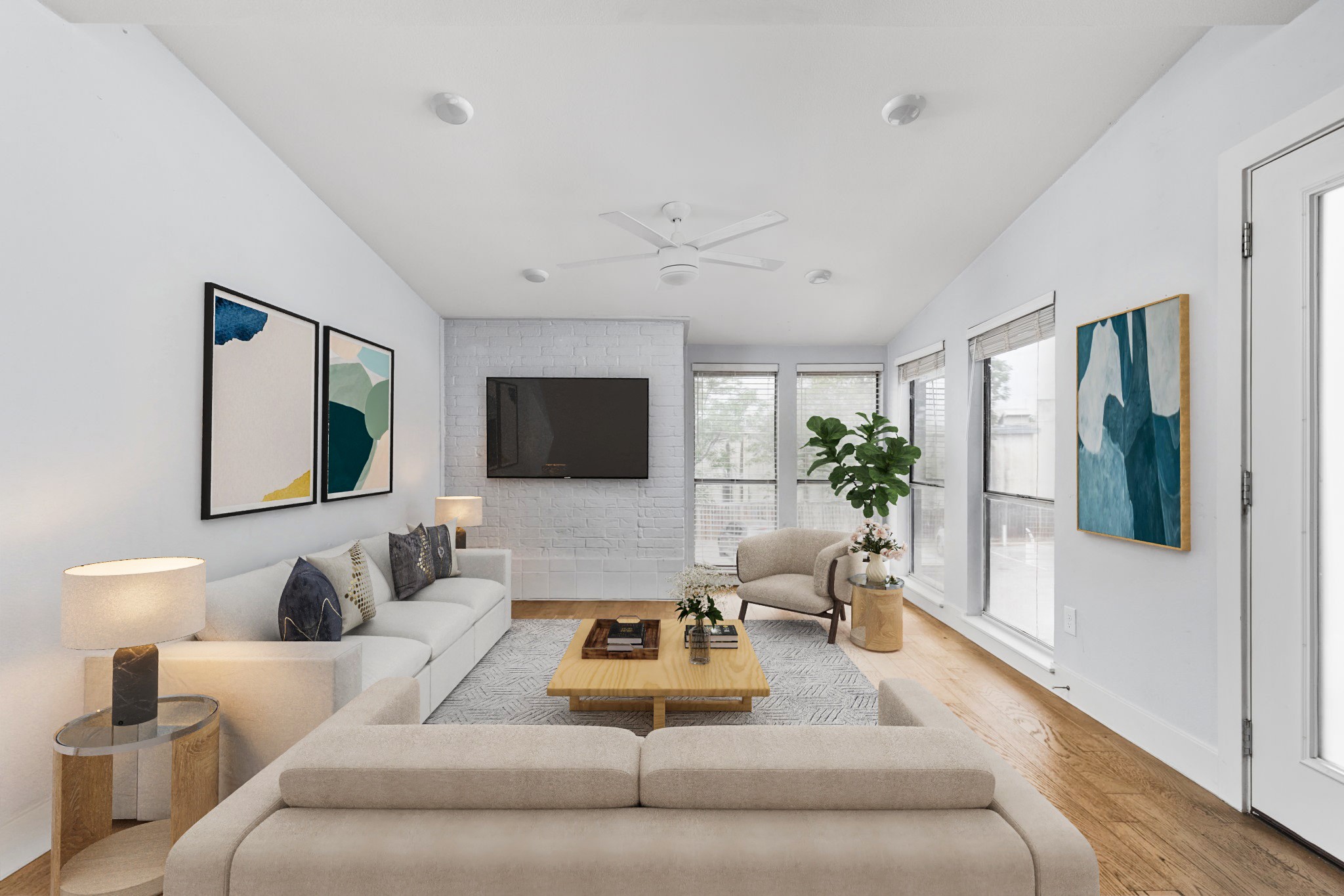 a living room with furniture and a flat screen tv