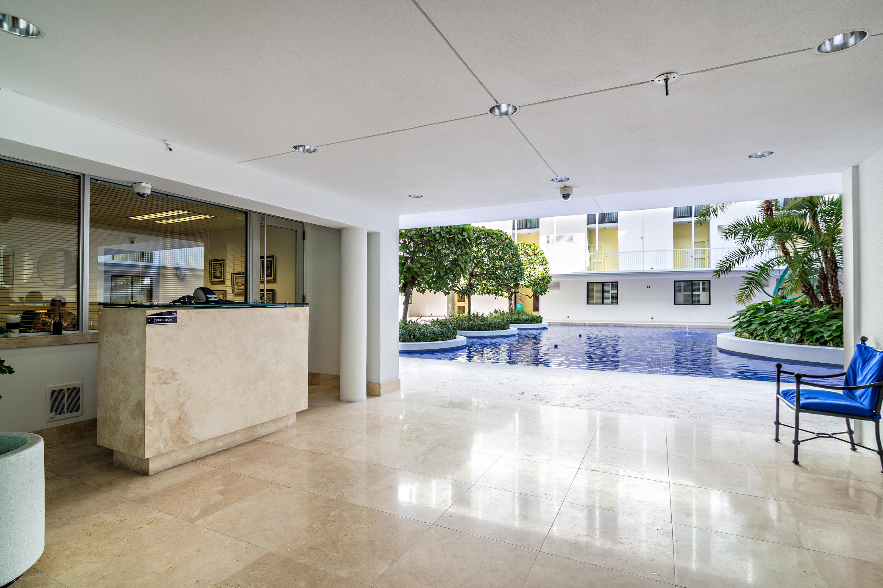 400 South Ocean Boulevard, Unit 419 Palm Beach, FL 33480 - Photo 17 of 24 a view of a living room and kitchen