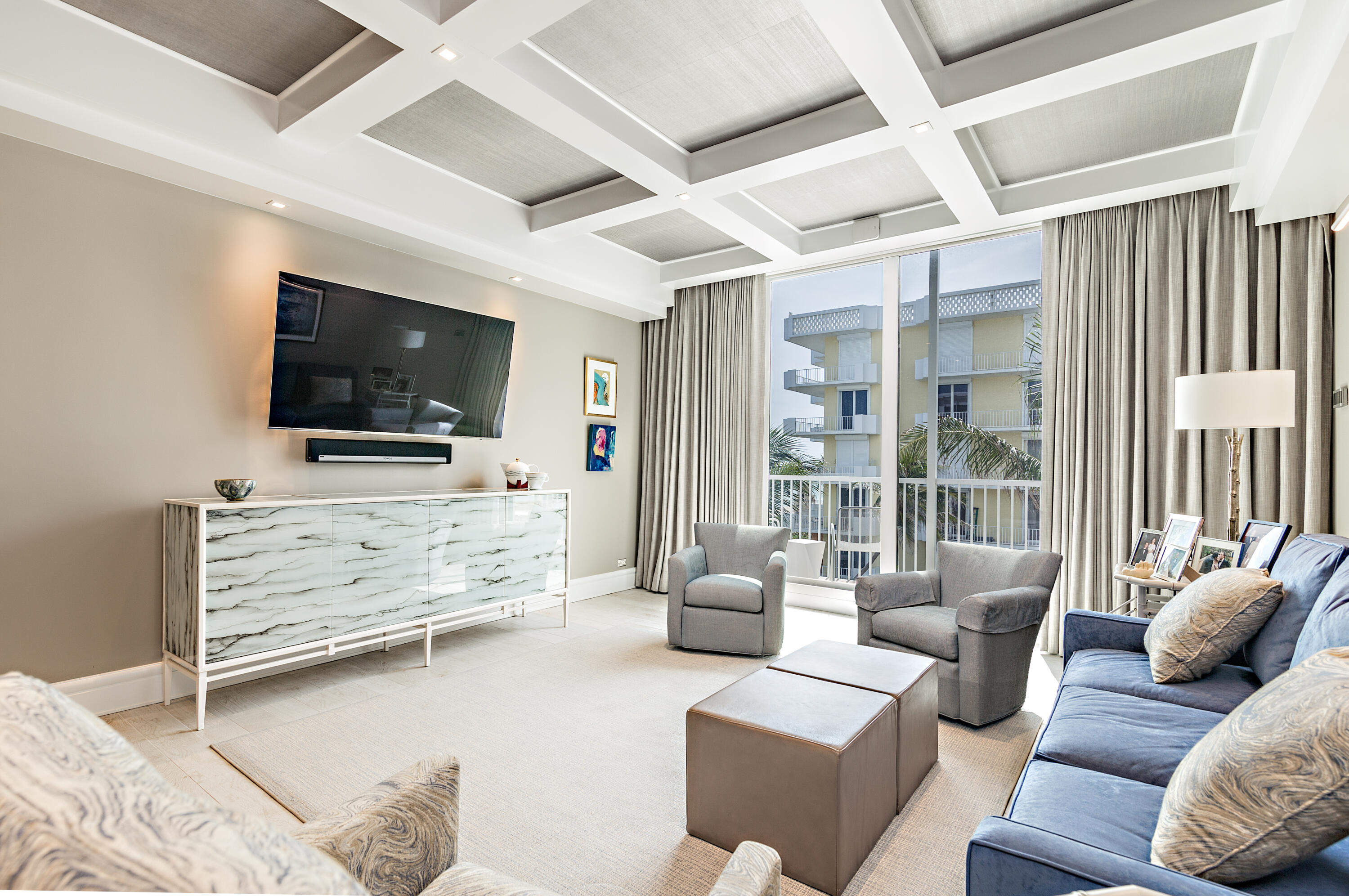 400 South Ocean Boulevard, Unit 419 Palm Beach, FL 33480 - Photo 4 of 24 a living room with furniture and flat screen tv