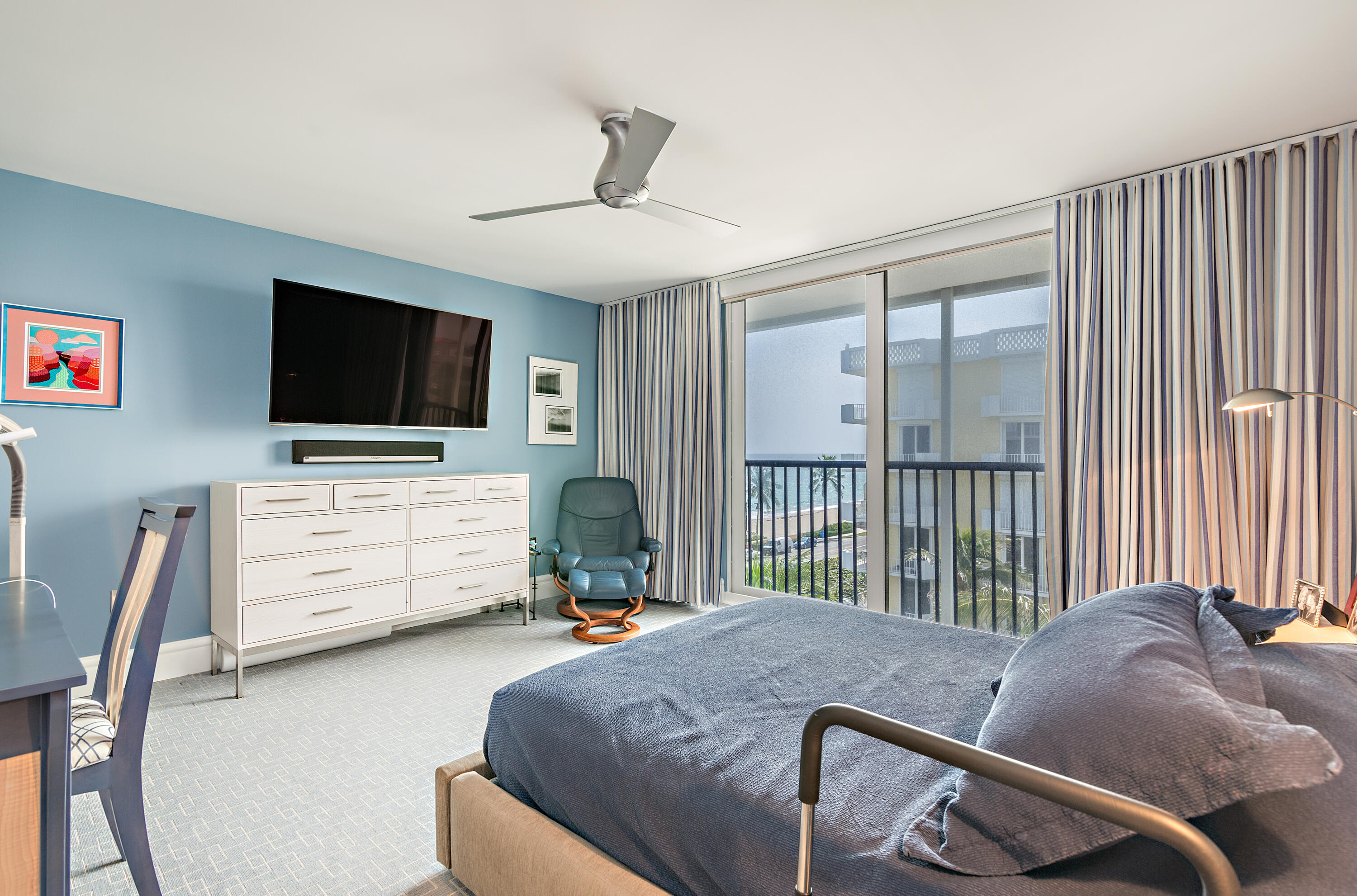 400 South Ocean Boulevard, Unit 419 Palm Beach, FL 33480 - Photo 10 of 24 a living room with furniture and a flat screen tv