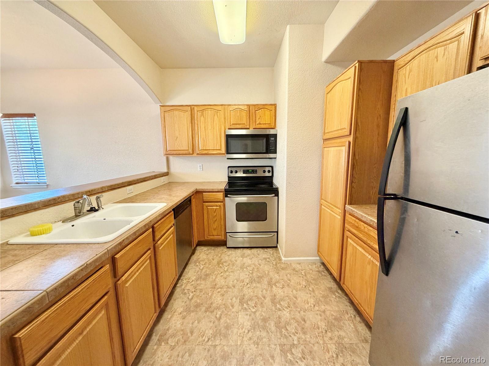 1385 South Chambers Road, Unit 102 Aurora, CO 80017 - Photo 3 of 14