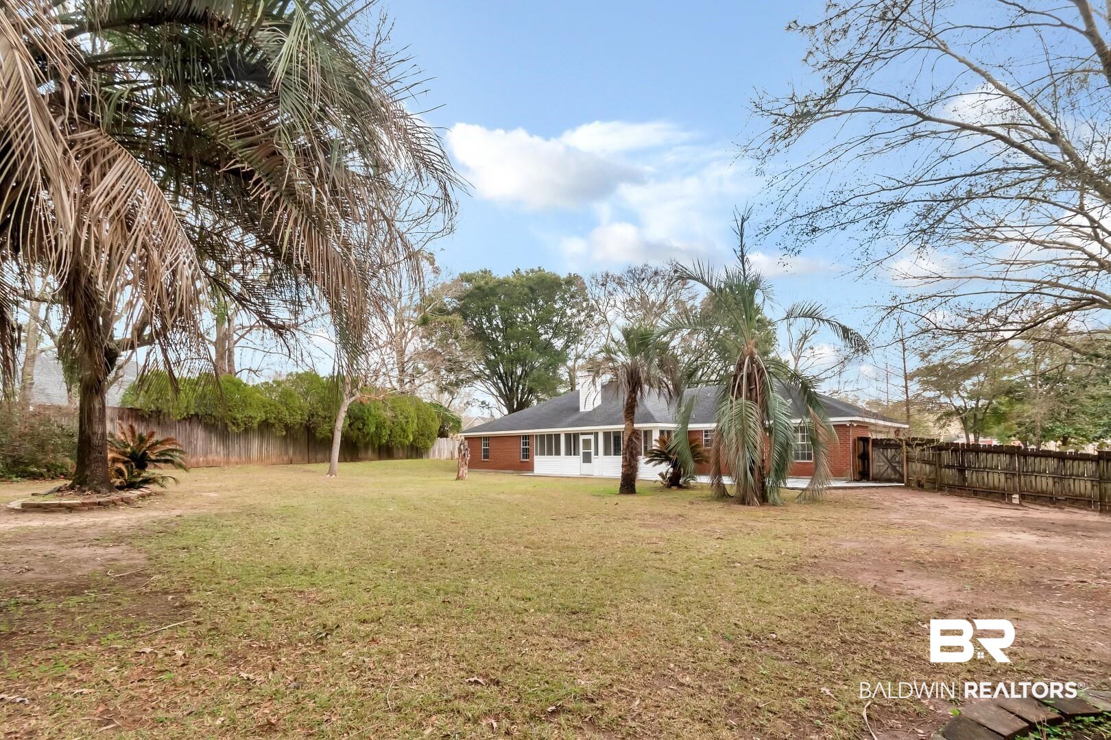 10006 Wedgefield Court Mobile, AL 36608 - Photo 15 of 34 View of yard featuring a fenced backyard