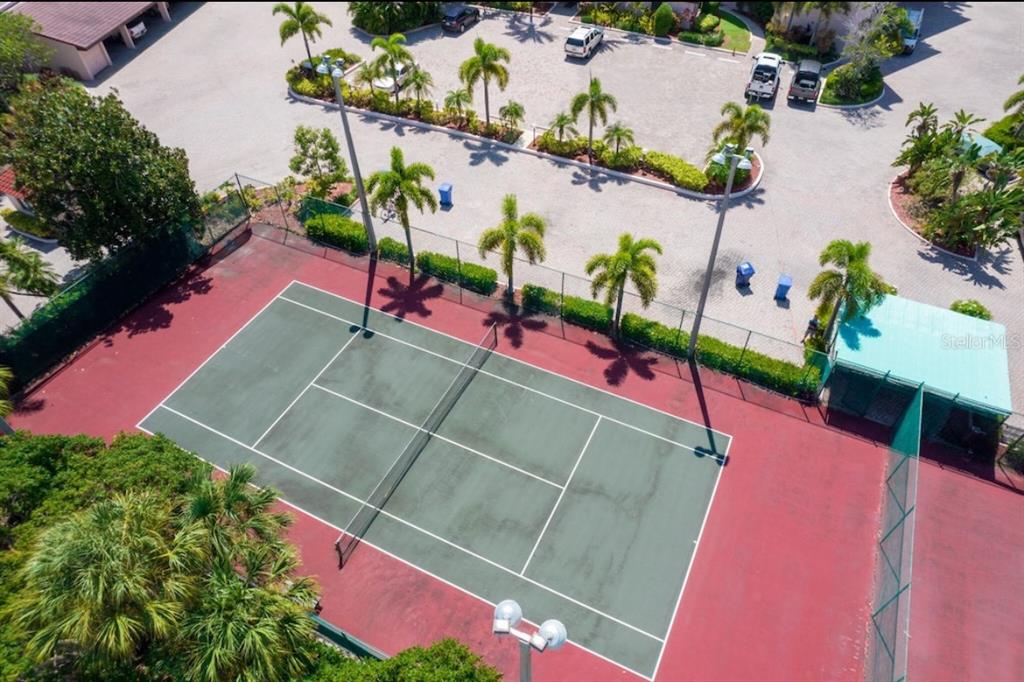 6480 Midnight Pass Road, Unit 316 Sarasota, FL 34242 - Photo 22 of 23 Tennis Courts located at the entrance of Siesta Breakers